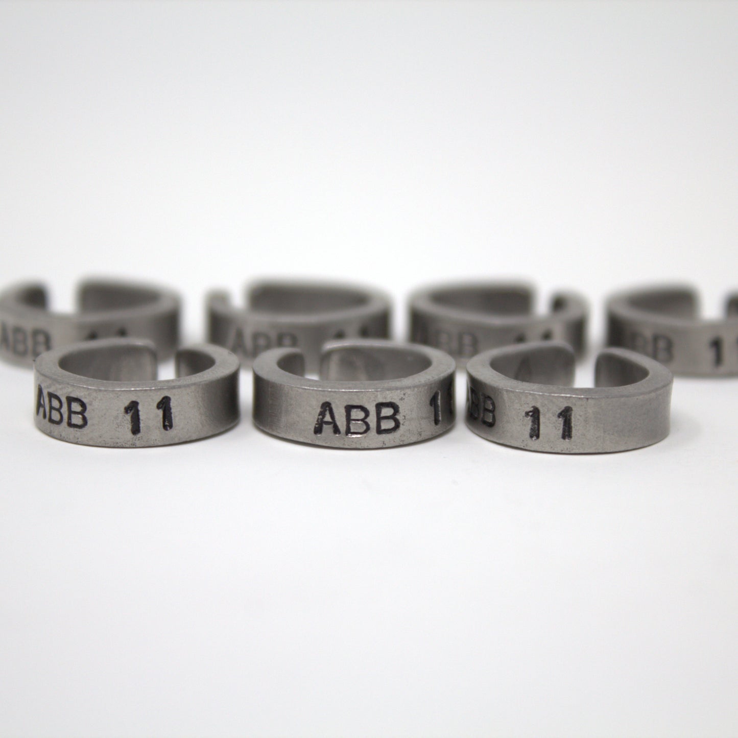 Split Bent Stainless Steel Leg Bands - Stamped